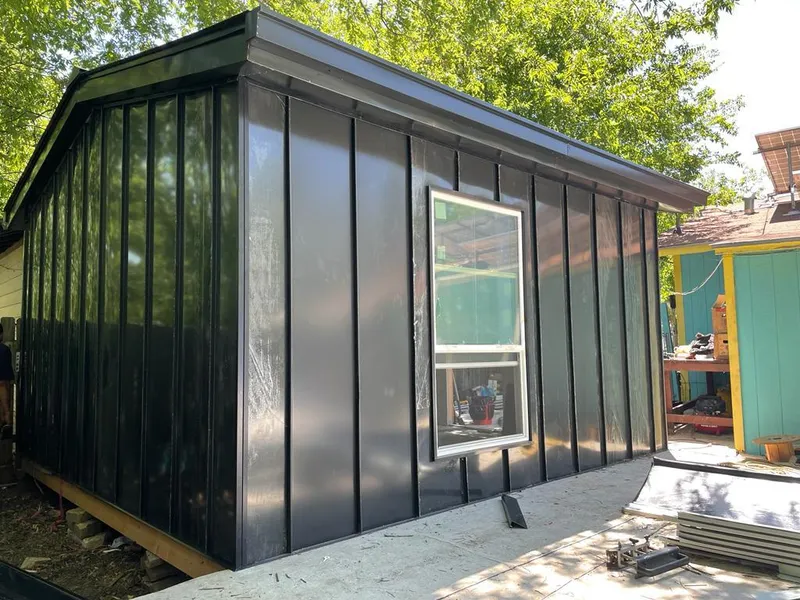 Black standing seam metal wall panels for Roof Inspection in Lafayette